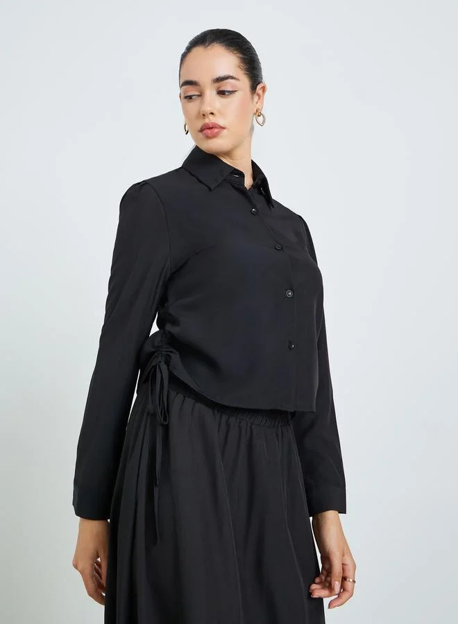 أميرة طقم من قميص مزموم وتنورة طويلة محتشم